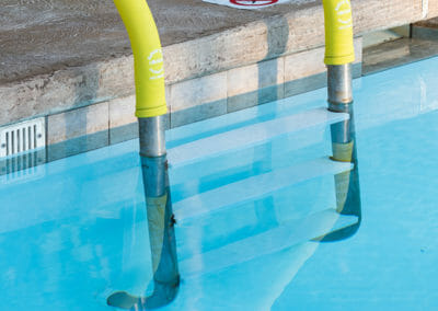 high visibility yellow safety grip pool handrail cover